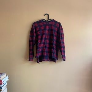 Checkerboard red and blue wool sweater.